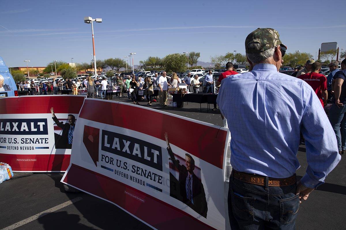 Hundreds wait in line to hear Florida Gov. Ron DeSantis speak at a rally for Nevada Republican ...