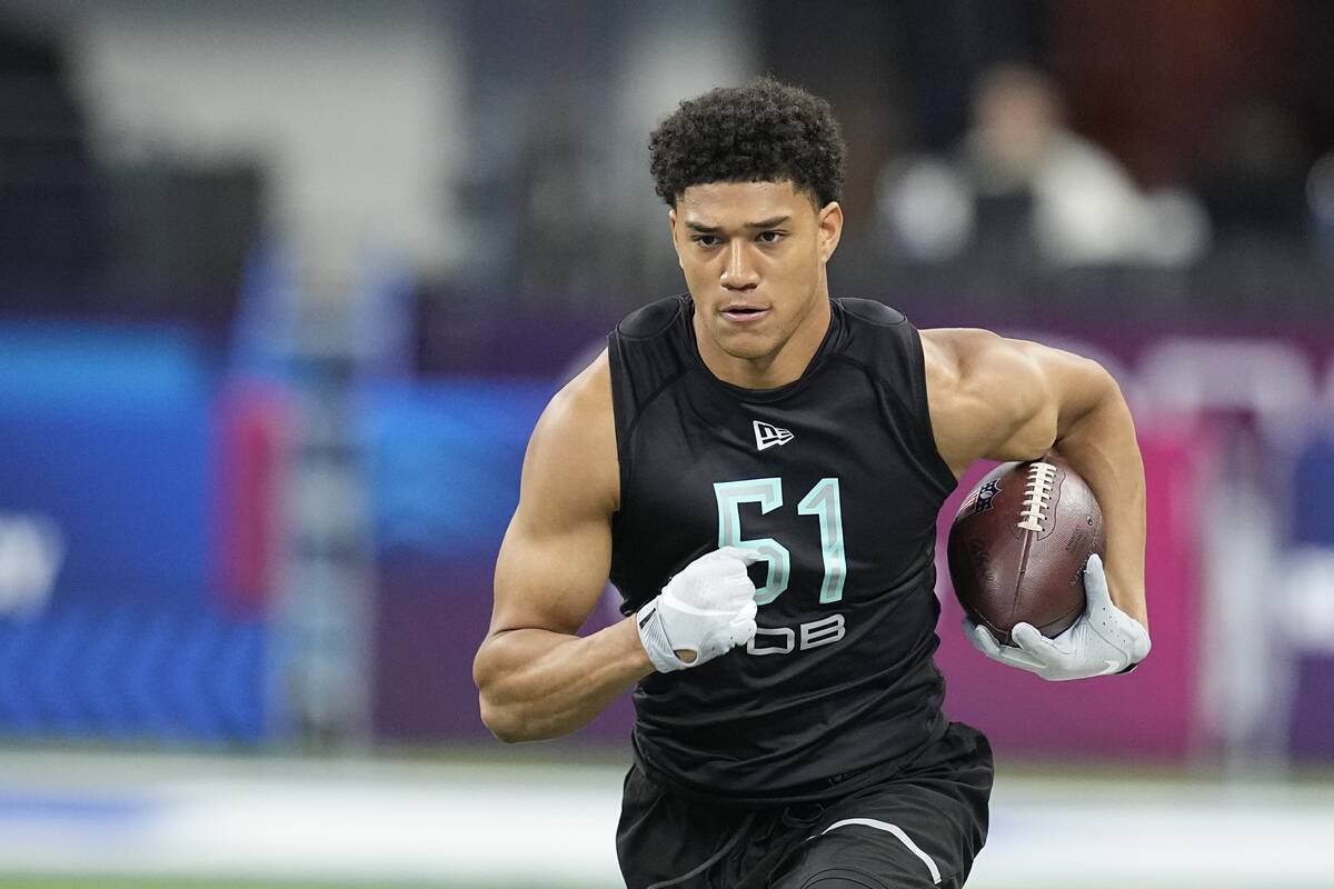 Notre Dame defensive back Kyle Hamilton runs a drill during the NFL football scouting combine, ...