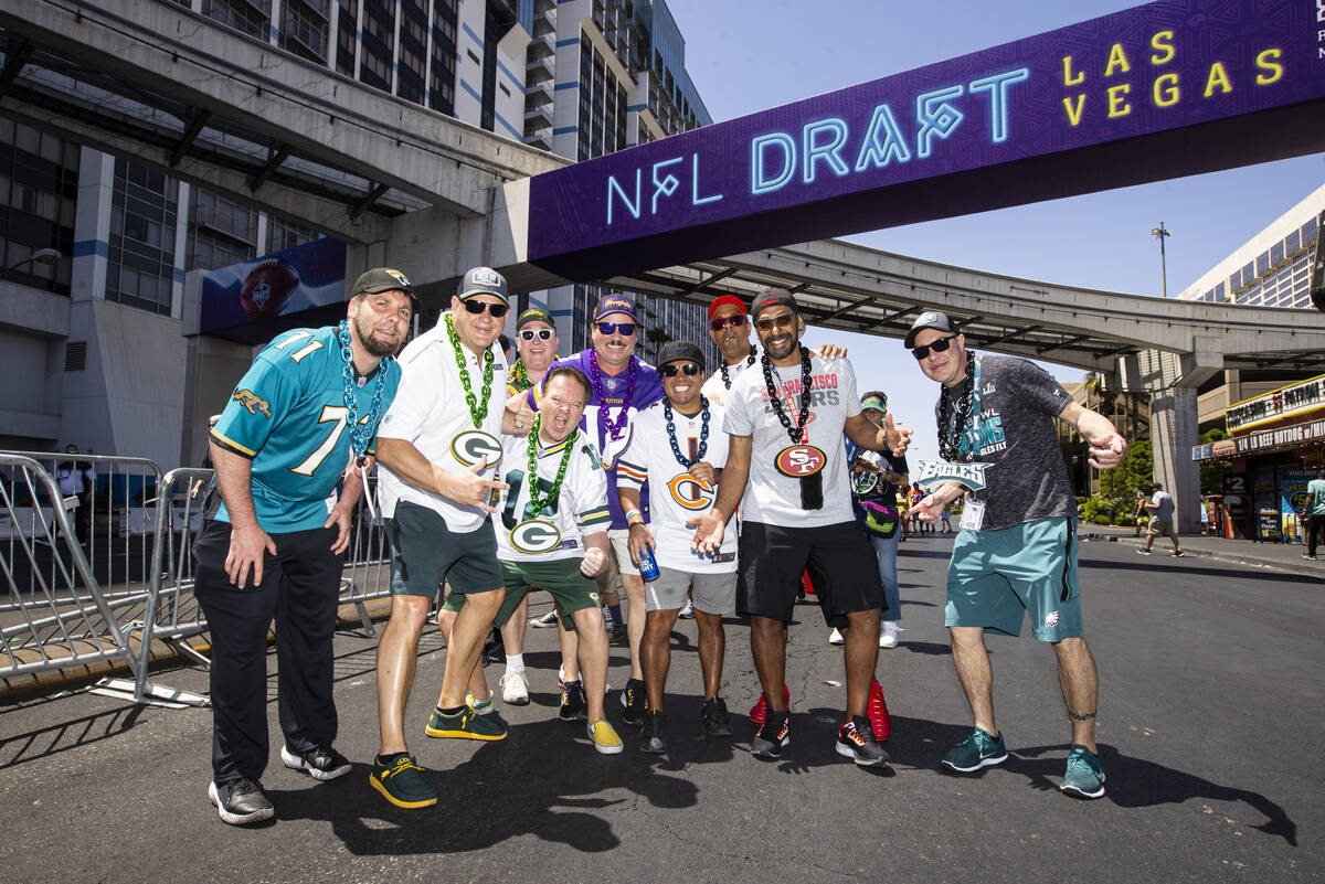 A group of friends from Wisconsin pose for a picture as they arrive for the first day of the NF ...