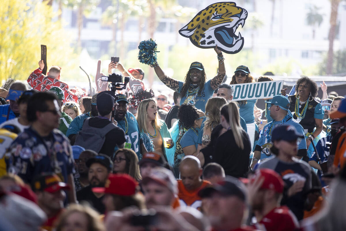Fans cheer as the NFL Draft event gets started in Las Vegas, Thursday, April 28, 2022. (Erik Ve ...