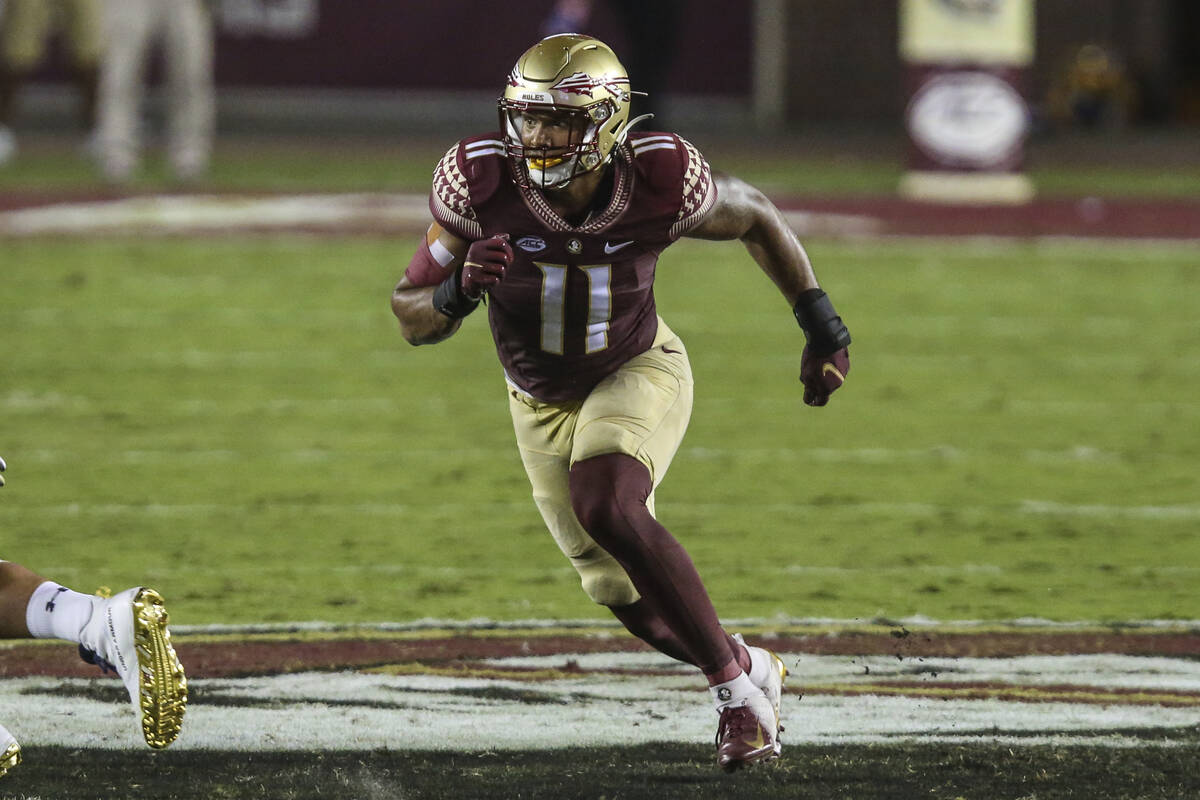 Florida State defensive end Jermaine Johnson II (11) during an NCAA football game against Notre ...