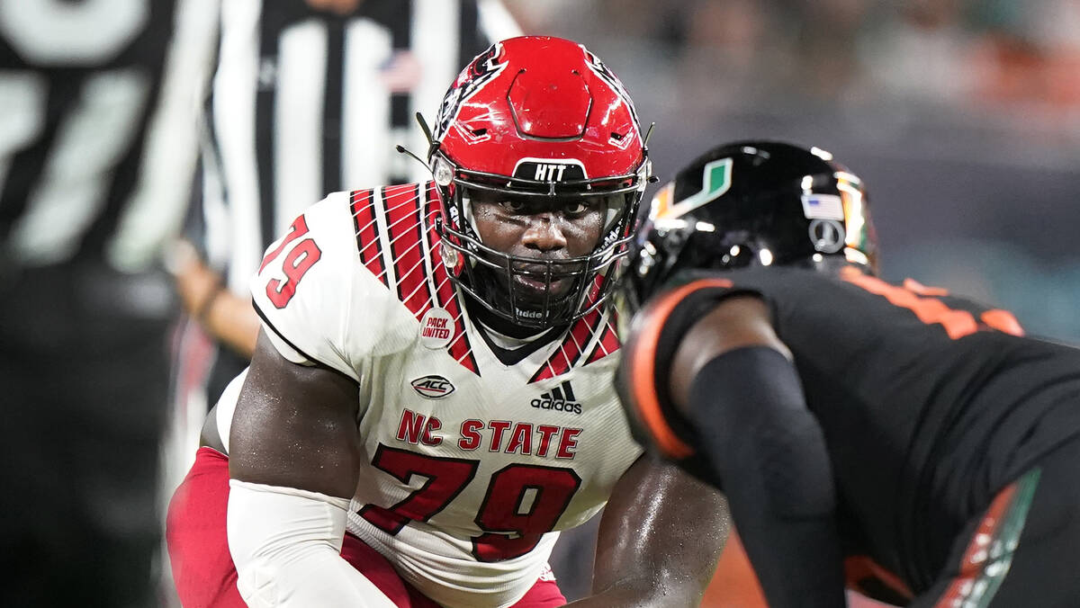 North Carolina State offensive tackle Ikem Ekwonu prepares to block a player during the first h ...