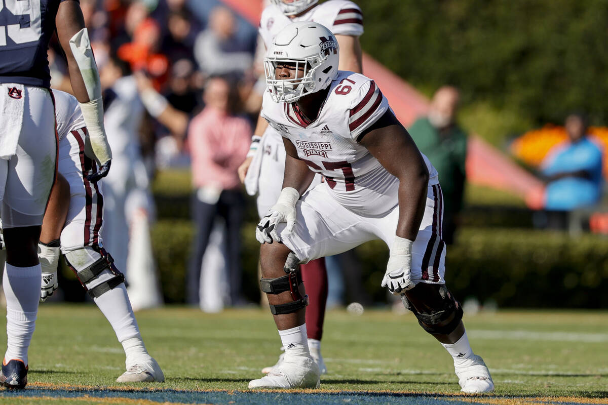 Mississippi State offensive lineman Charles Cross (67) lines up for the play against Auburn dur ...