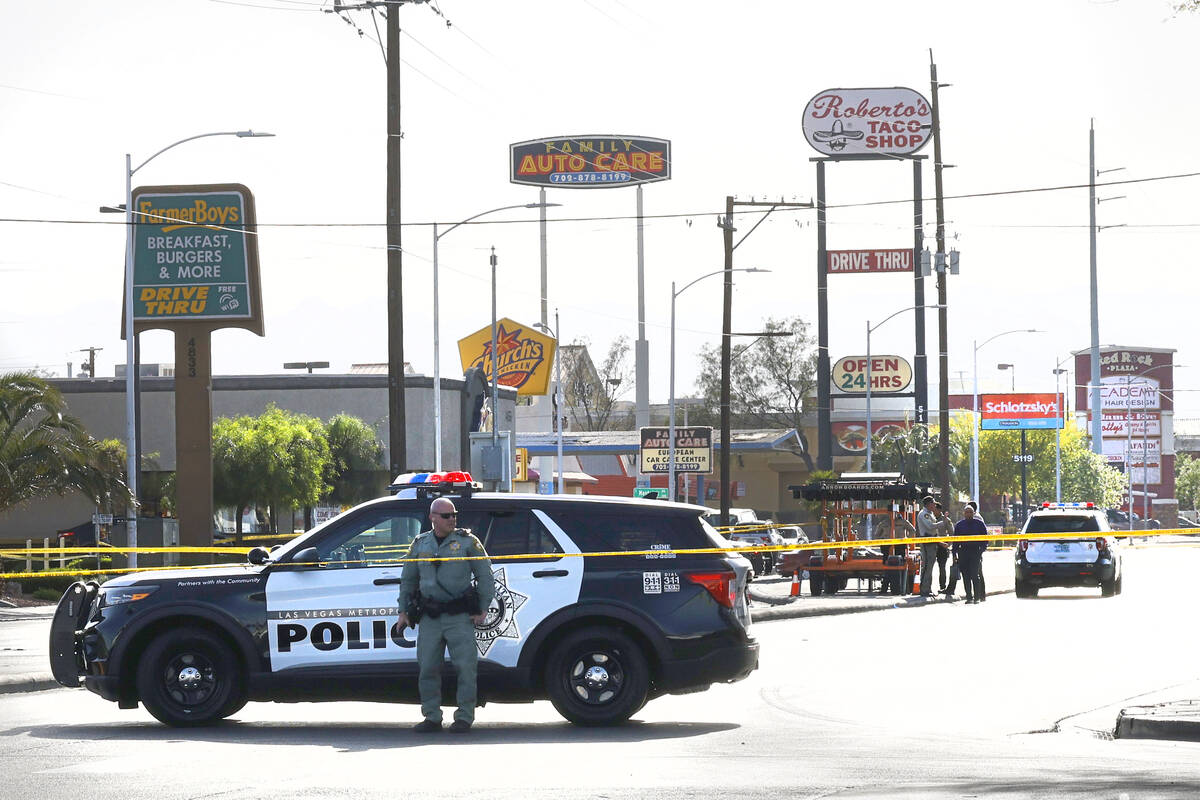 Las Vegas police investigate a shooting near the intersection of Decatur and Charleston boulev ...