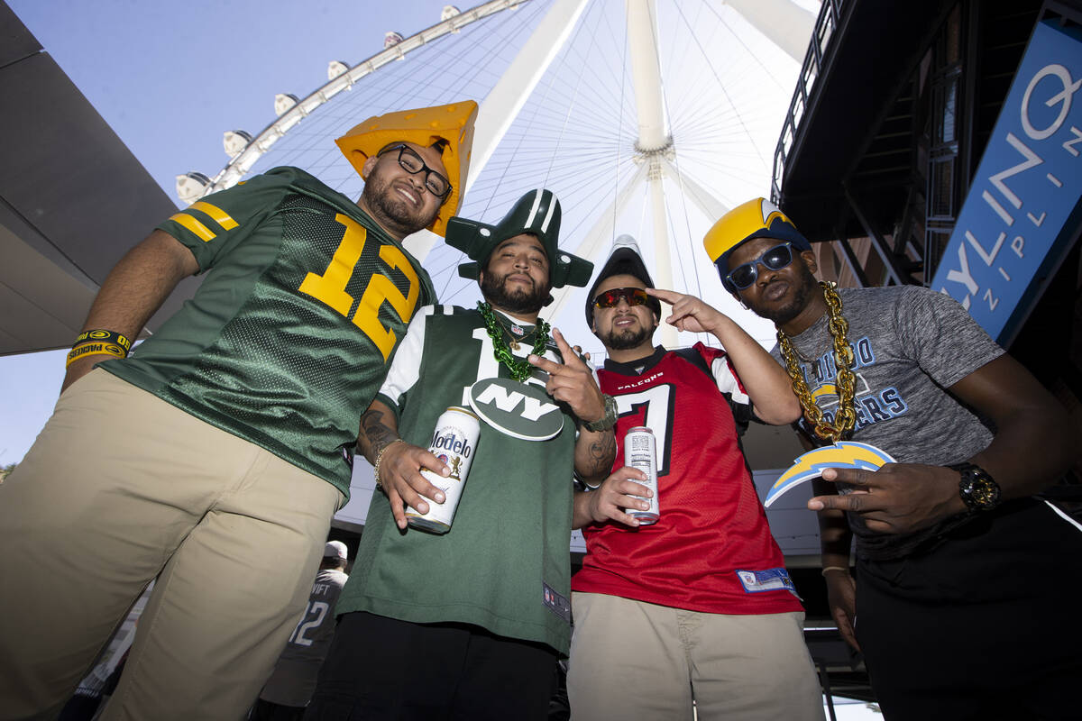 Los Angeles resident Eddie Dueñas, from left, Josh Dueñas, Jonathan Sosa, and Richard ...