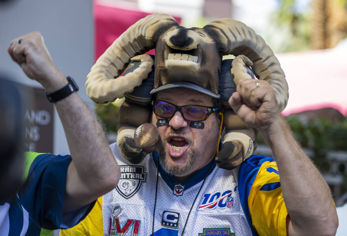 Los Angeles Rams fan Karl Sides, aka Ram Man, cheers before the start of the 2022 NFL Draft fro ...