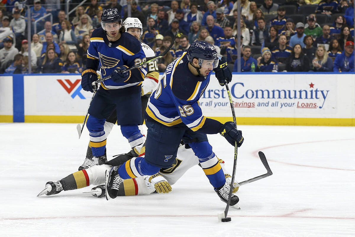 St. Louis Blues' Jordan Kyrou (25) shoots, scoring a goal during the second period of the team' ...