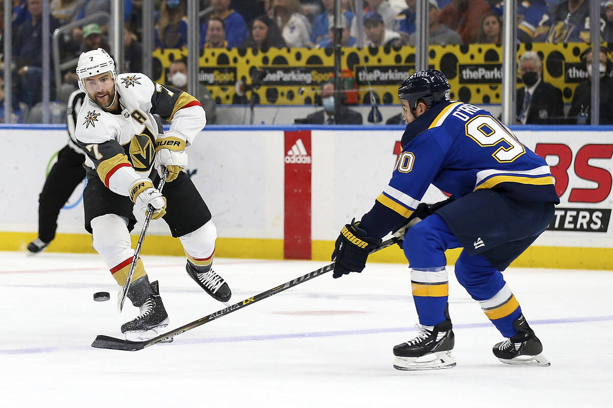 Vegas Golden Knights' Alex Pietrangelo (7) passes the puck while under pressure from St. Louis ...