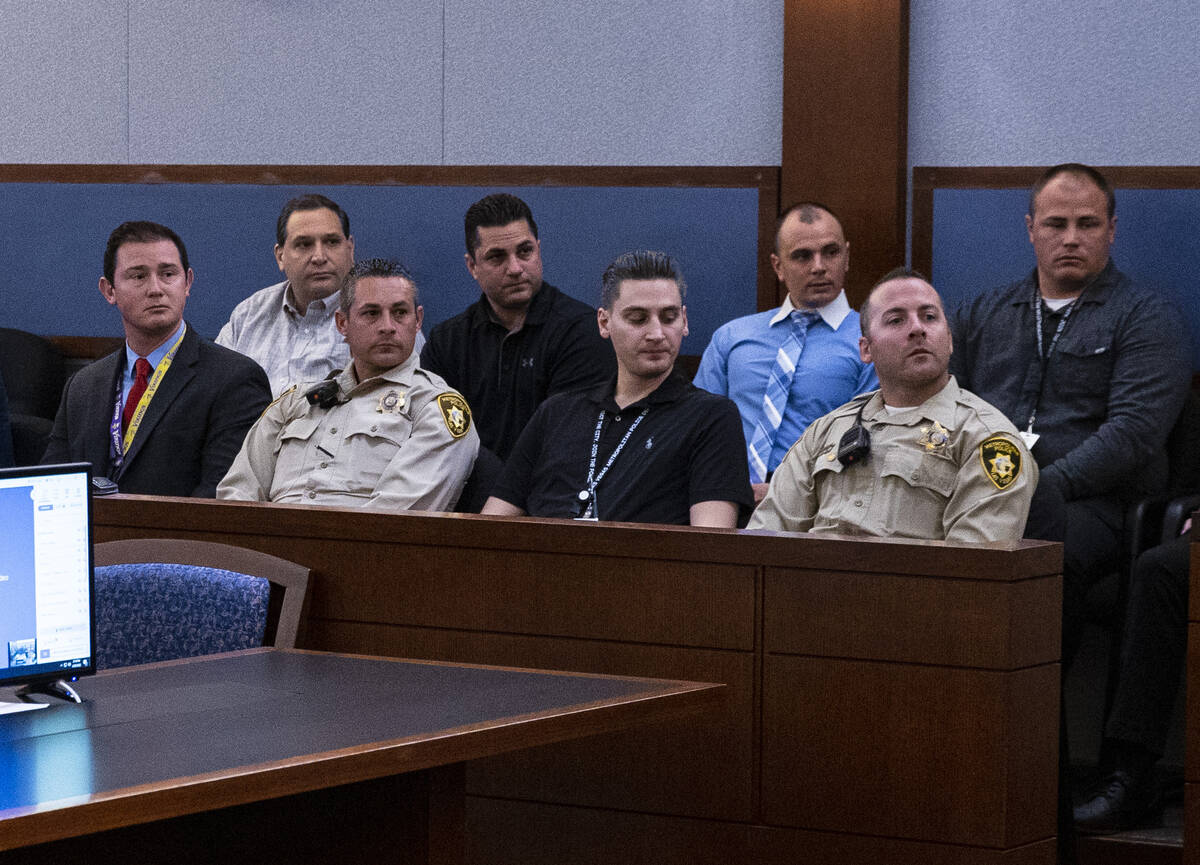 Las Vegas police officers attend the sentencing of Edgar Samaniego, not photographed, at the Re ...