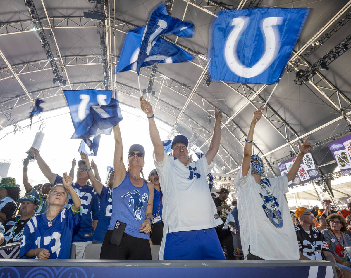 Indianapolis Colts fans cheer at the Draft Theater during the second day selections for the 202 ...
