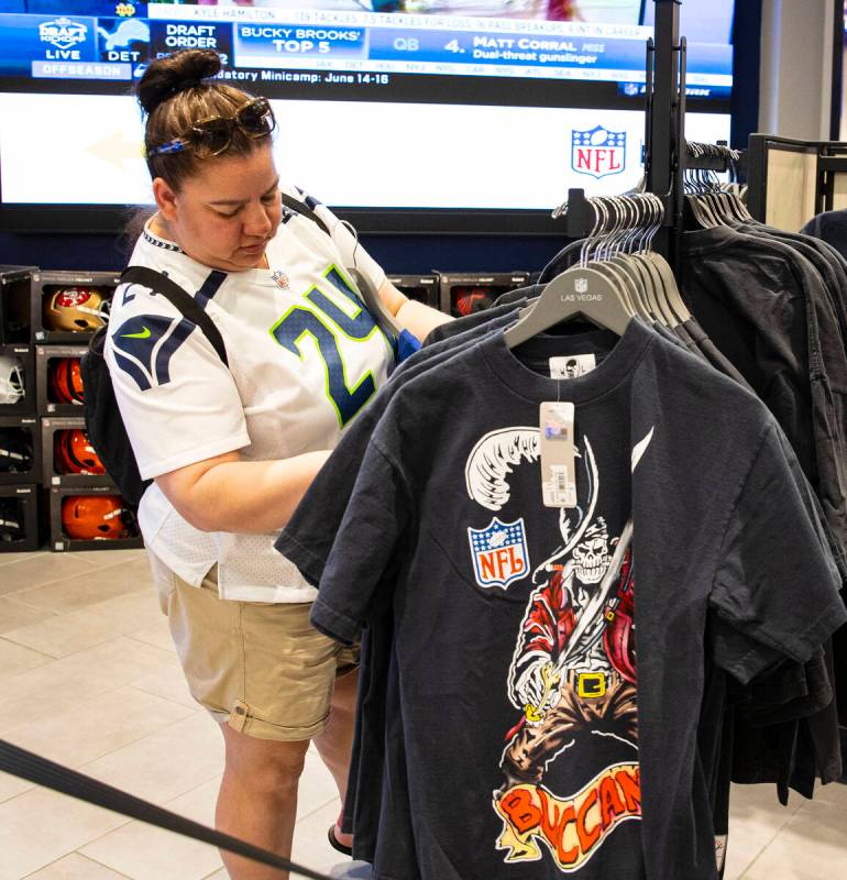 Amber Martin of Vancouver, Canada, checks out the Warren Lotas x Mitchell & Ness capsule co ...