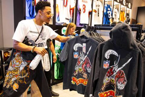 Dameon Cooper of Los Angeles checks out the Warren Lotas x Mitchell & Ness capsule collecti ...