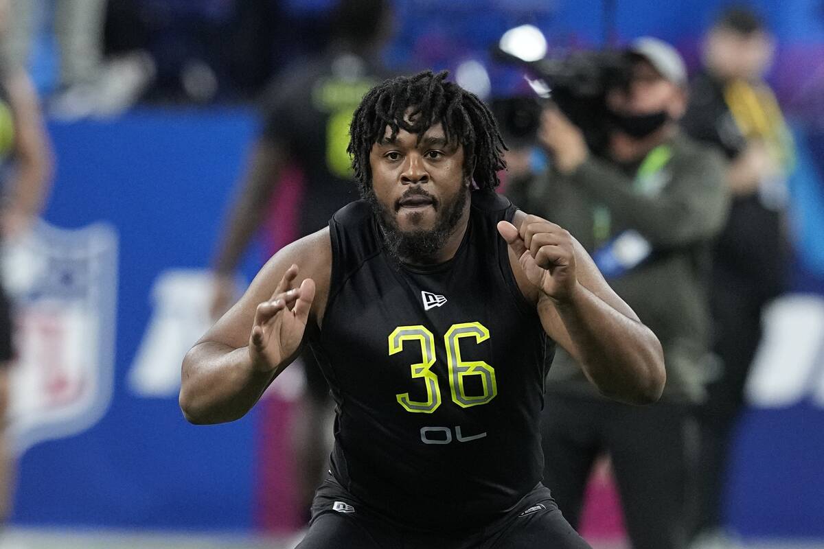 Memphis offensive lineman Dylan Parham runs a drill during the NFL football scouting combine, F ...
