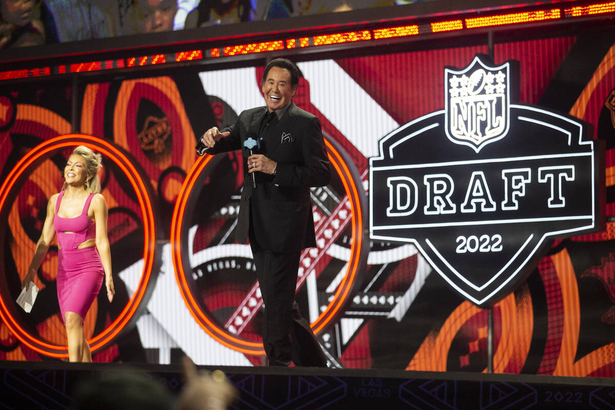 Wayne Newton stands on the stage after announcing the Raiders 90th overall draft selection duri ...