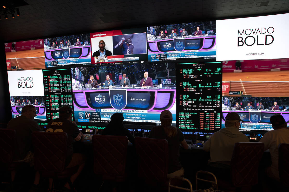 NFL football draft coverage plays in the sportsbook at Circa, Friday, April 29, 2022, in Las Ve ...