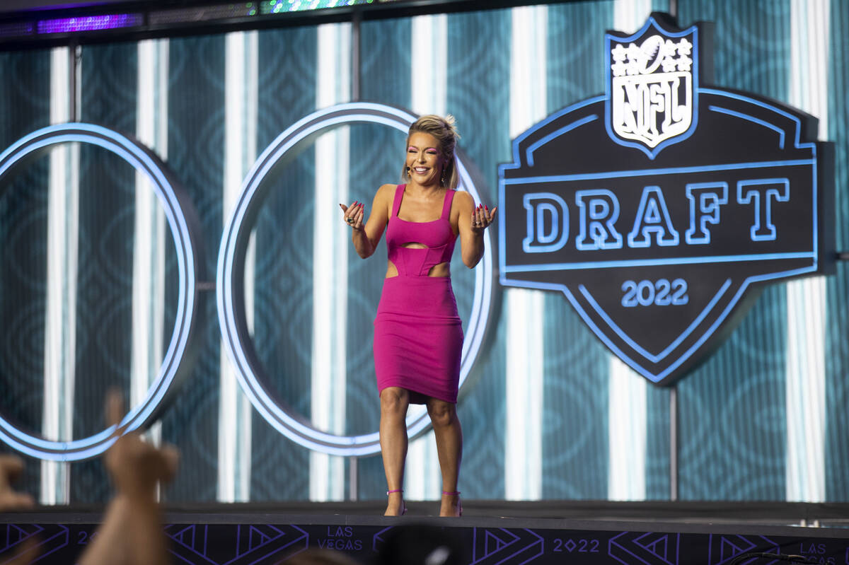 Host Colleen Wolfe talks to fans during the second day of the NFL Draft event in Las Vegas, Fri ...