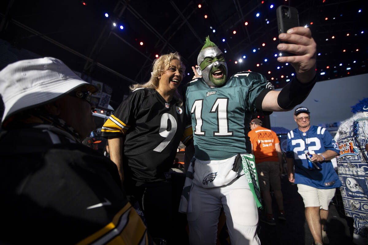 Fans record a video on a cellphone during the second day of the NFL Draft event in Las Vegas, F ...