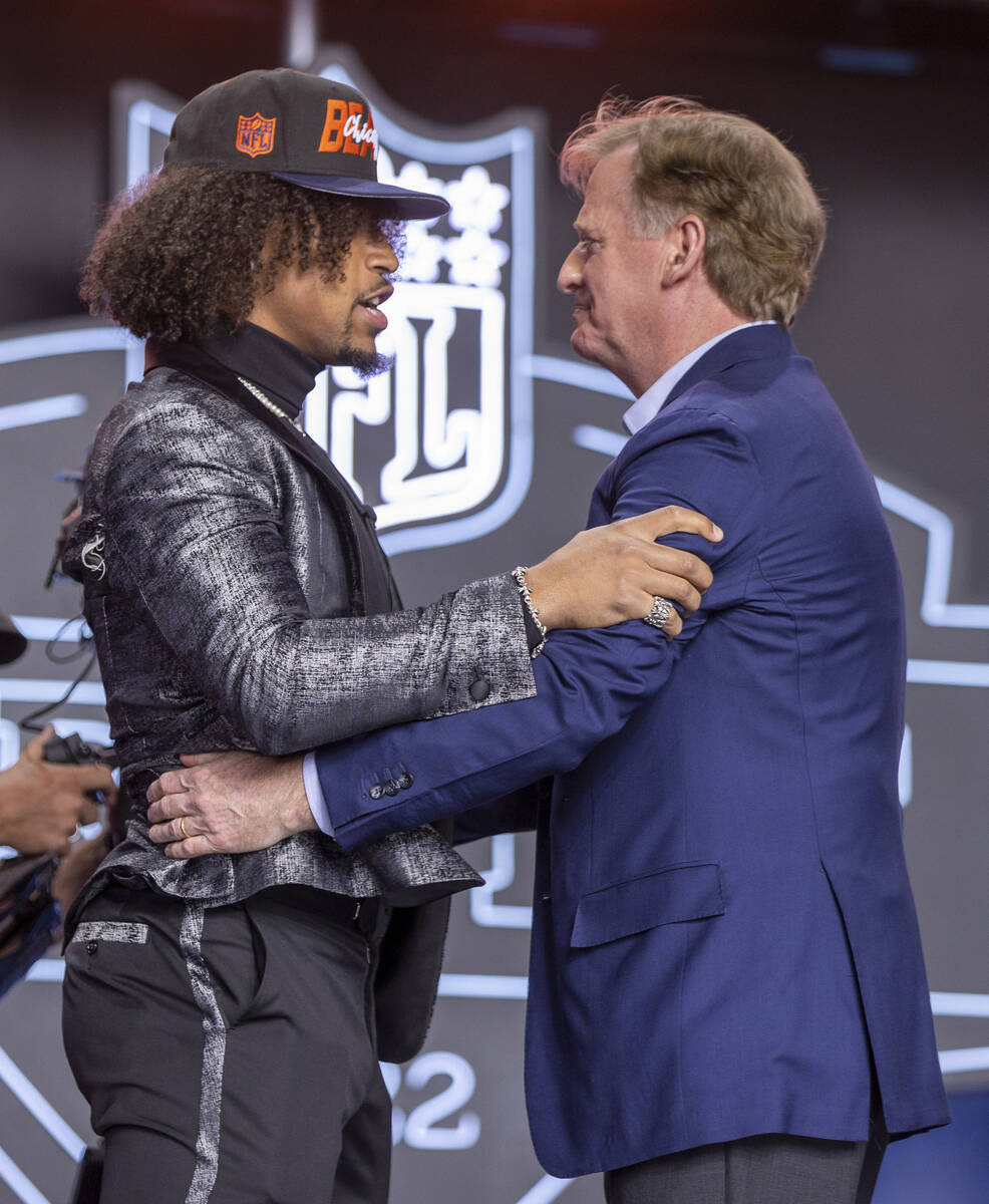 Seattle Seahawks 41st pick selection Kenneth Walker of Michigan State is congratulated by Comm ...