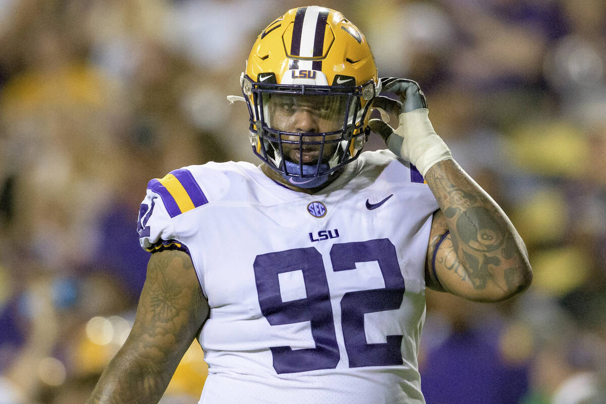 LSU defensive lineman Neil Farrell Jr. (92) lines up during an NCAA football game against Aubur ...