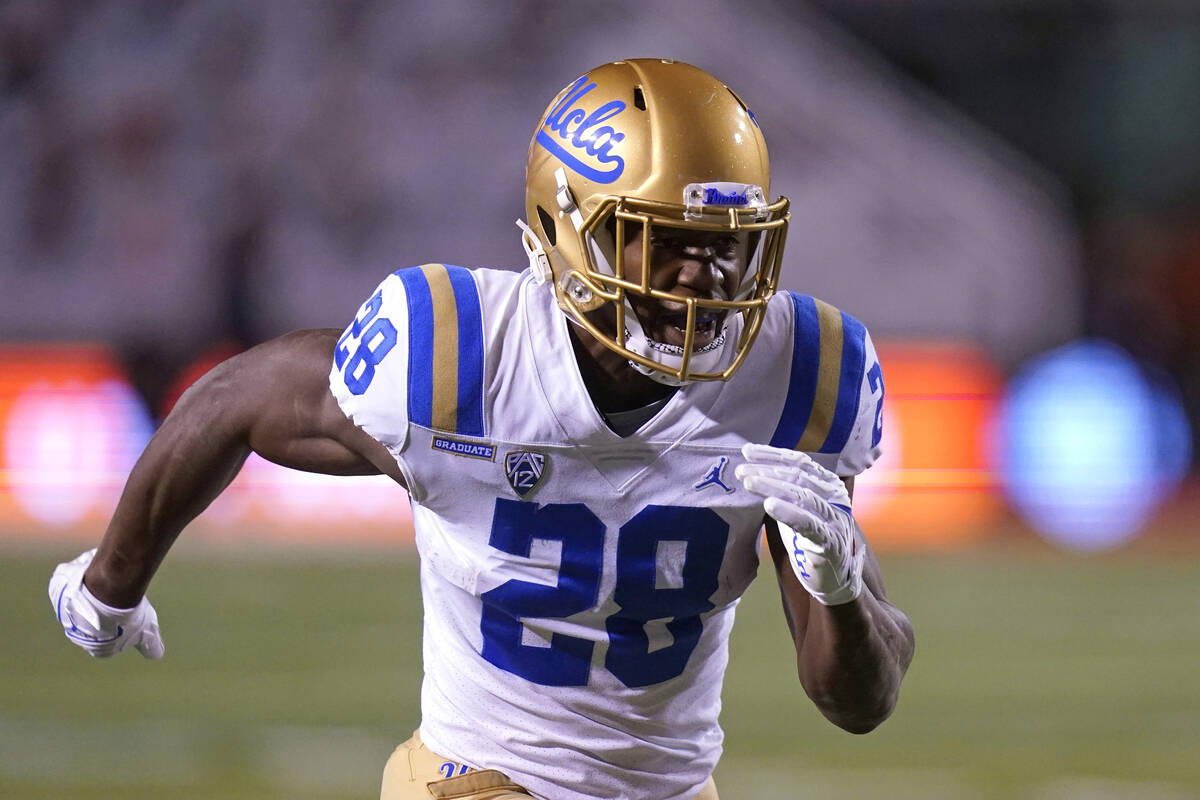 UCLA running back Brittain Brown (28) runs down field in the second half during an NCAA college ...
