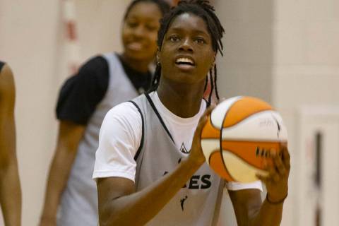 Las Vegas Aces forward Mya Hollingshed prepares to throw the ball during team’s practice ...