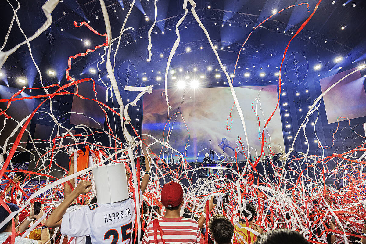 Confetti fills the air as Marshmello performs at the conclusion of the 2022 NFL draft on Saturd ...
