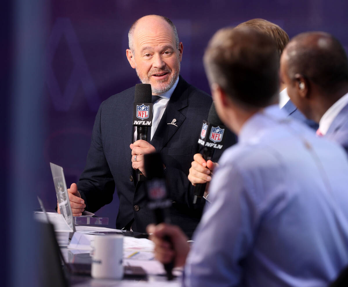 Rich Eisen of the NFL Network prepares to host the broadcast on the Bellagio fountains during t ...