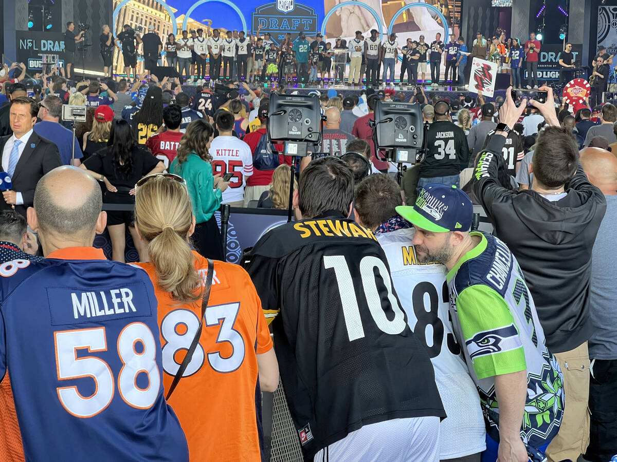 Youth football players are honored on the main stage at the NFL Draft Experience during the fin ...