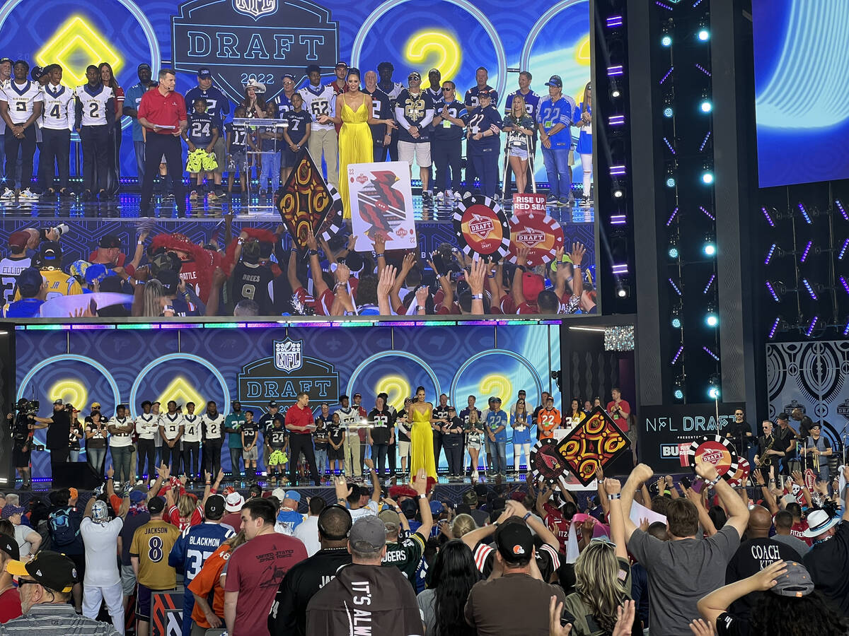 Youth football players are honored on the main stage at the NFL Draft Experience during the fin ...