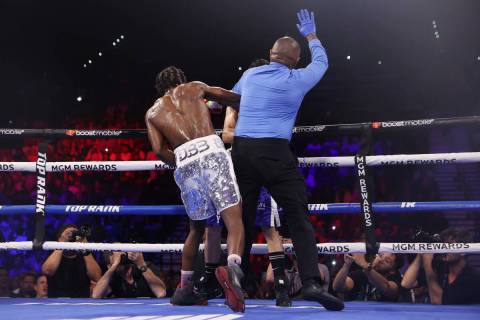 Keyshawn Davis finishes Esteban Sanchez in the sixth round for a technical knockout win in a li ...