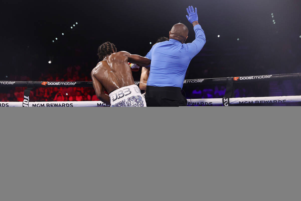 Keyshawn Davis finishes Esteban Sanchez in the sixth round for a technical knockout win in a li ...