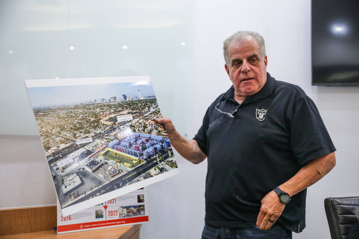 Arnold Stalk speaks to the Review-Journal as he holds a photo of some of the SHARE Village camp ...