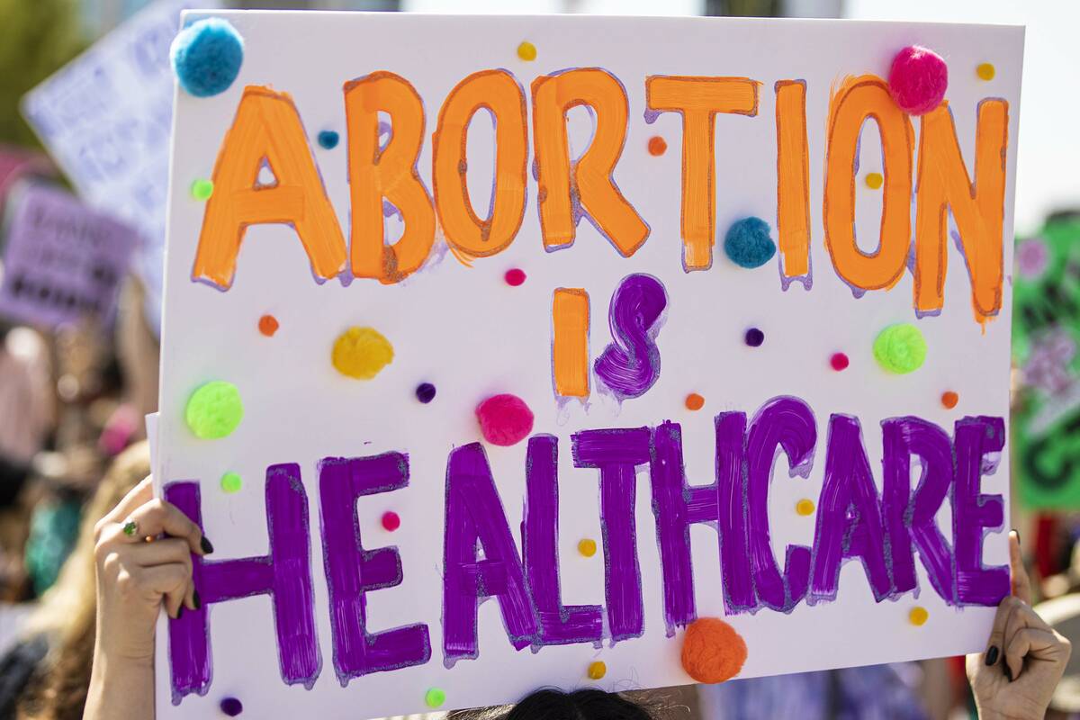 Demonstrators gather outside the Lloyd D George Courthouse during a March for Reproductive Righ ...