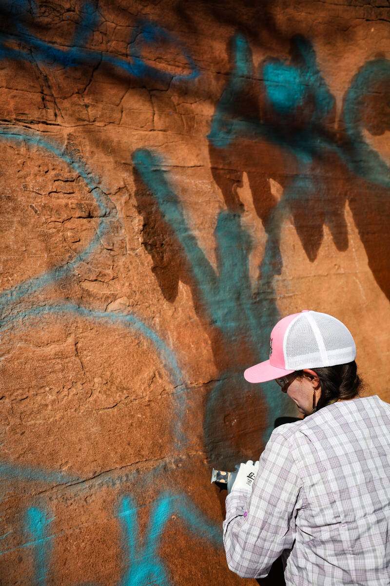 Lisa Harrison, the volunteer coordinator for the Southern Nevada Climbers Coalition, works to r ...