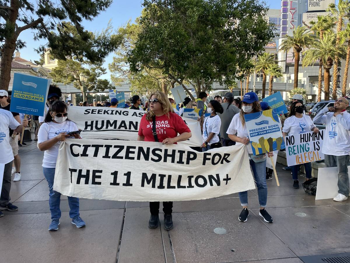 Community members march down the Las Vegas Strip to advocate for undocumented immigrants' right ...