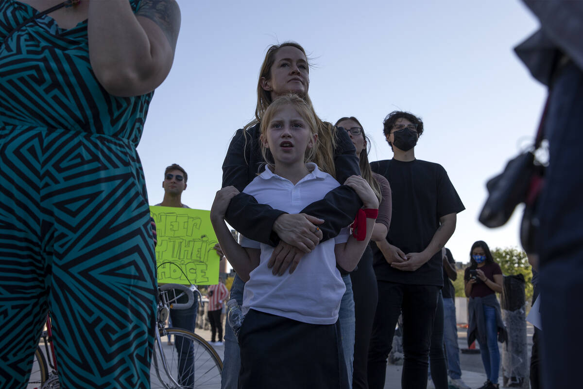 Pamela Hoffman and her daughter Daisy Hoffman, 9, attend a rally in support of abortion rights ...