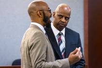 Wendell Melton, right, accused of killing his 14-year-old son in 2017, listens to his attorney ...