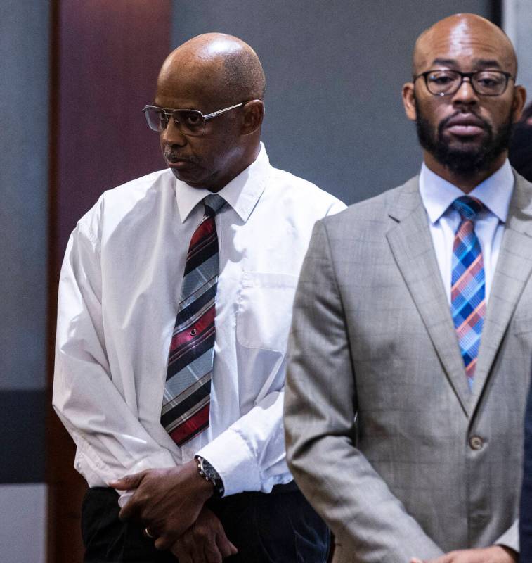 Wendell Melton, left, accused of killing his 14-year-old son in 2017, and his attorneys Jonatha ...