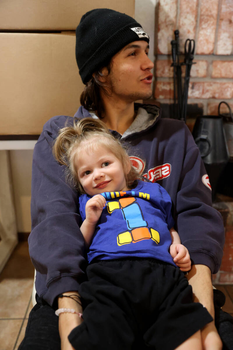 Siblings Jaden Dominic Hairr, 16, and Aksel, 1, at their Henderson home Friday, April 22, 2022. ...