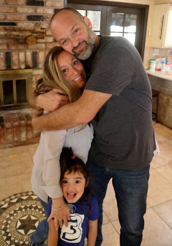 Aimee and Heath Hairr, with their daughter Joselyn Elizabeth Hairr, 3, at their Henderson home ...