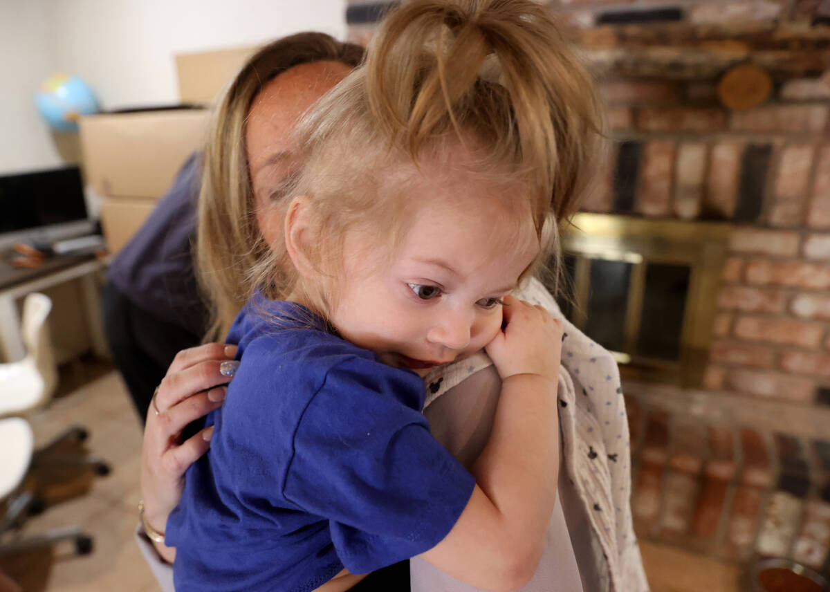 Aimee Hairr with Aksel, 1, at their Henderson home Friday, April 22, 2022. Hairr and her husban ...