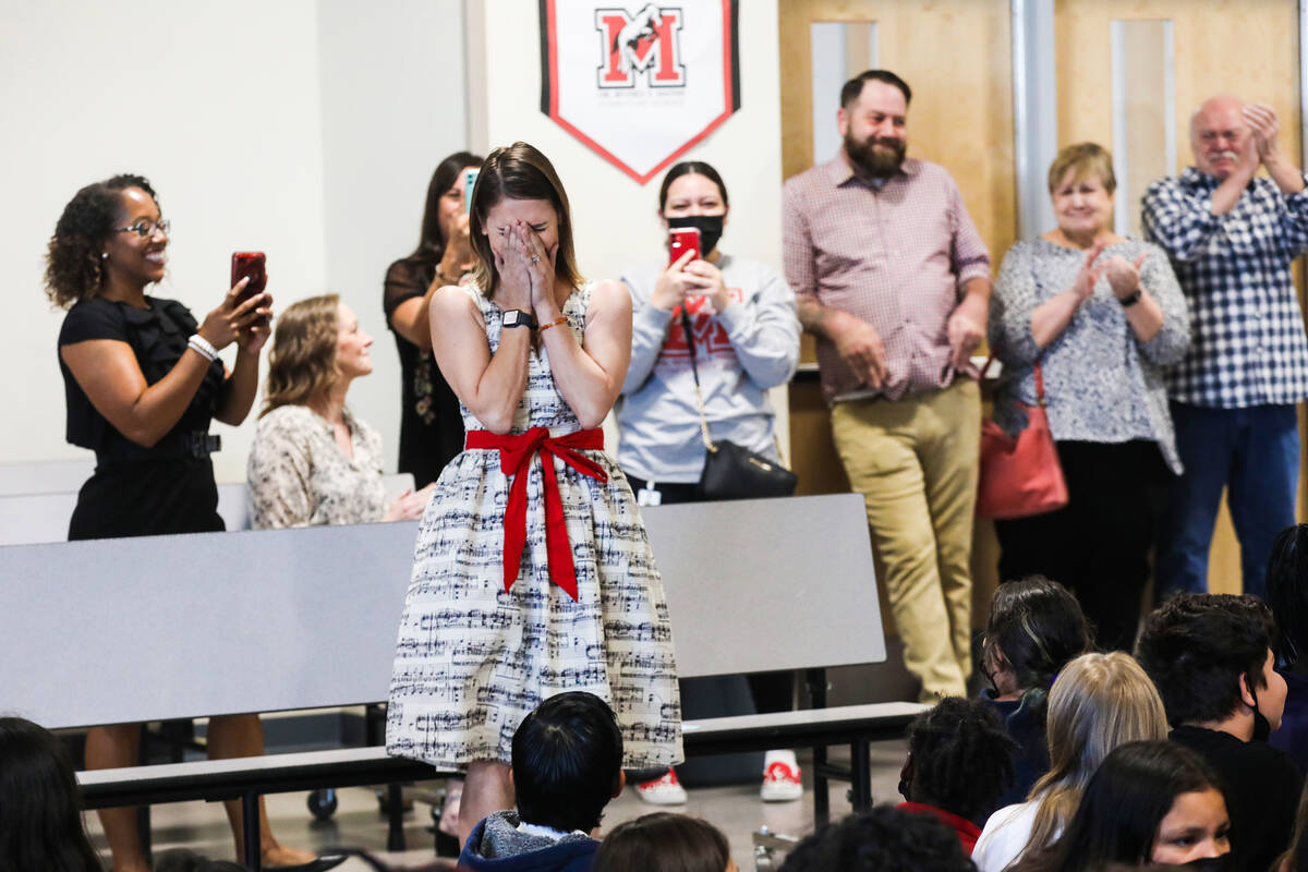 Music teacher Ali Jun reacts after she wins the Milken Educator Award, an accolade for general ...