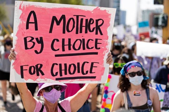 Demonstrators gather outside the Lloyd D George Courthouse during a March for Reproductive Righ ...