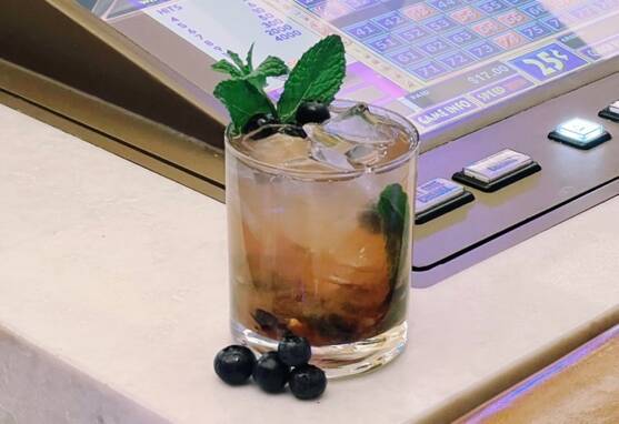 A berry mint julep featuring Woodford Reserve Bourbon, demerara syrup and blueberries will be s ...