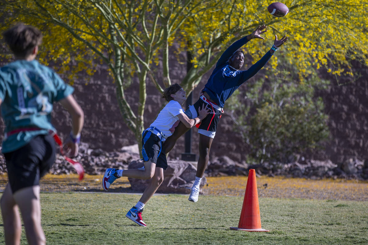 Kids play flag football as part of a celebration of life for Austen Russell, 9, who died when h ...