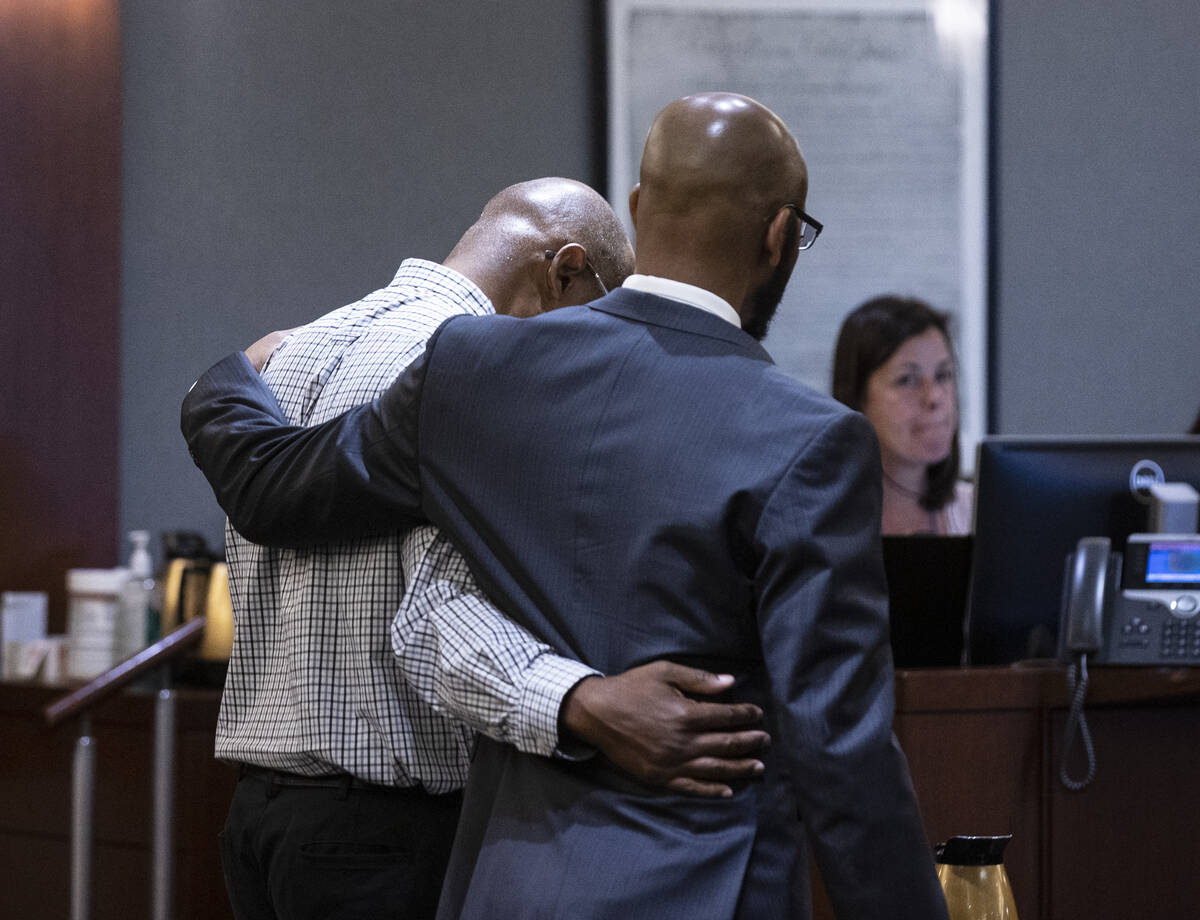 Wendell Melton, left, is comforted by his attorney Jonathan MacArthur after a jury found him gu ...