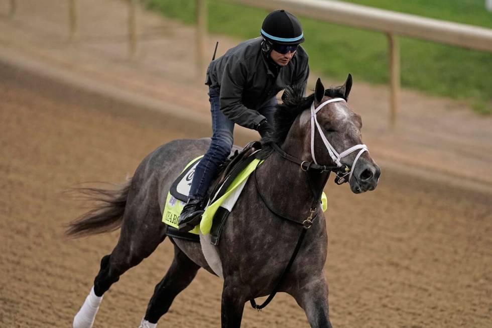 Kentucky Derby entrant Charge It works out at Churchill Downs Wednesday, May 4, 2022, in Louisv ...