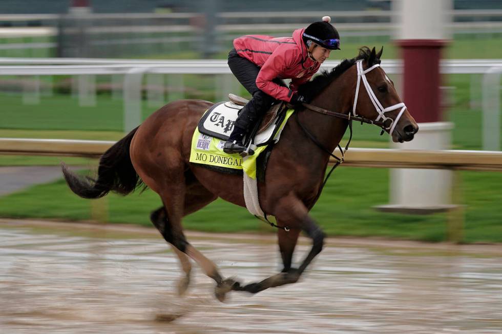 Kentucky Derby entrant Mo Donegal works out at Churchill Downs Tuesday, May 3, 2022, in Louisvi ...