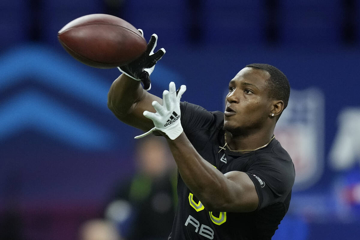 Georgia running back Zamir White catches a pass at the NFL football scouting combine in Indiana ...