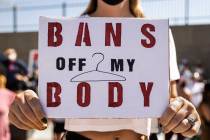 Chelsie Shurtleff demonstrates outside the Lloyd D George Courthouse during a March for Reprodu ...